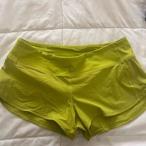 Lululemon speed up short. 2.5 inch. Size 8. Bright neon yellow!